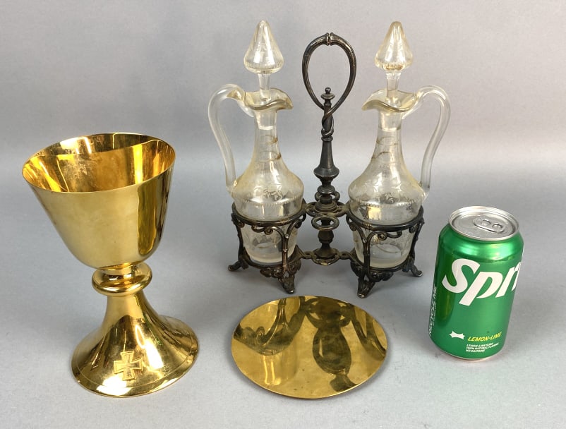 Gold Plated Chalice & Paten Plate w/ Other Item: Gold Plated Chalice & Paten. Etched glass wine decanters in silver plated holder. 71/4"h x 4 1/4"diam. Condition: Needs cleaning and some scratchesand suffs.