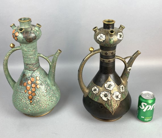 2 Art Nouveau Amphora Teplitz Vases: 2 Art Nouveau Amphora Vases. Possibly Paul Dachsel. 16 3/4"h x 11 1/2:diam. Condition: Old repairs to green vase, see photos.