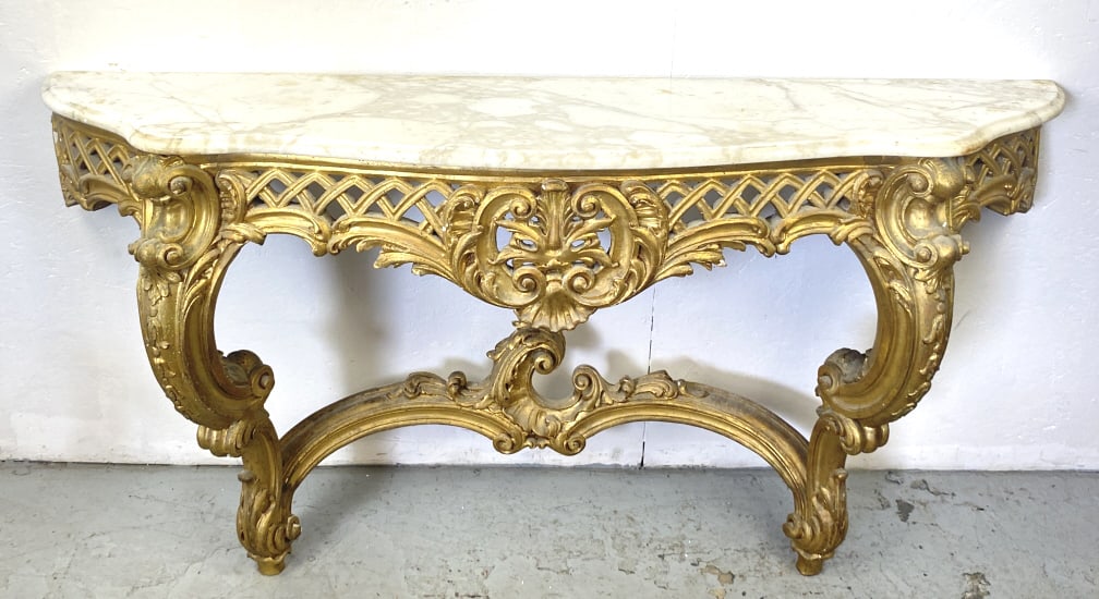 Rococo Style Giltwood & Marble Console: Rococo Style Giltwood & Marble Console. 32 1/2"h x 62 1/2"w x 16"d Condition: Needs cleaning, some loss of gilt, stains to marble.