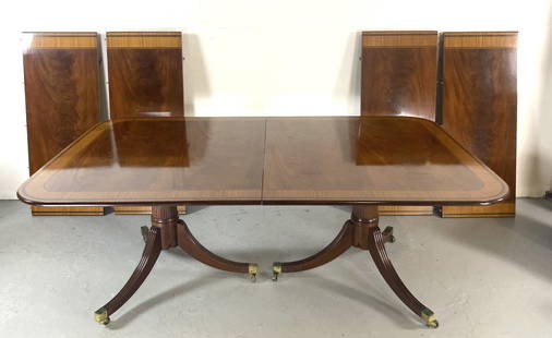 Baker Mahogany Double Pedestal Dining Table: Baker Mahogany Double Pedestal Dining Table. Crossed banded. From the Stately Homes and Garden Collection. Four 19"w leaves. 28 1/2"h x 77 3/4"w x 48"dCondition: Some scratches, scuffs, household pain