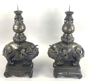 Pair of Chinese Bronze Foo Lion Candlesticks