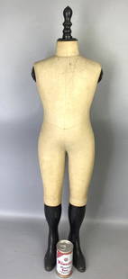 Small Vintage Store Mannequin: Small Vintage Store Mannequin signed Bussot Brussells. 40"h x 10"w x 7"d Condition: Some stains to fabric.