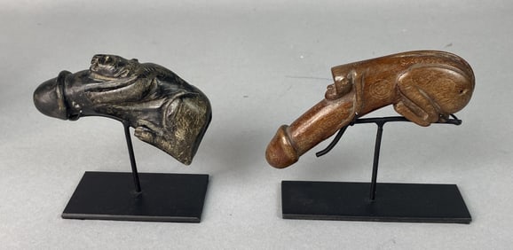 Two Carved Wood Phalluses on Stands