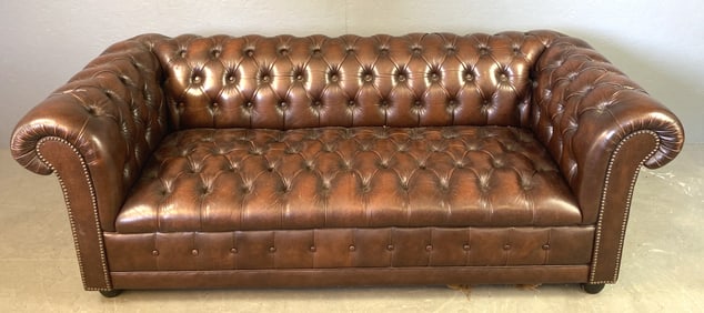 Brown Leather Chesterfield Sofa.