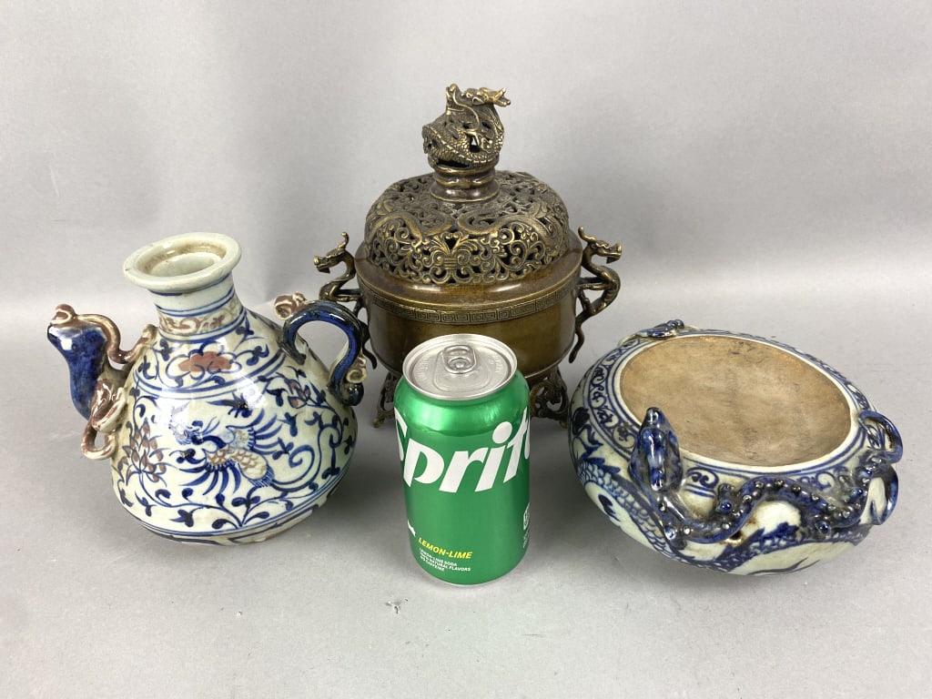 Chinese Bronze Incense Burner & 2 Blue Dishes: Chinese Bronze Incense Burner & 2 Blue Dishes. Incense burner: 9 1/2"h Condition: Blue porcelain stained.