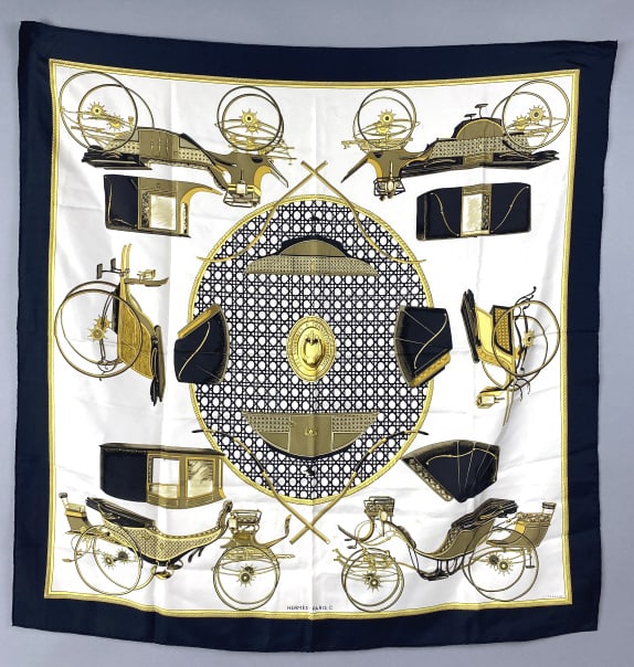 Hermes Carre 90 Les Voitures Scarf: Hermes Carre 90 Les Voitures Scarf "Les Voitures a Transformation" Scarf. 34 3/4"square Condition: Small stain, pen mark (pictured).