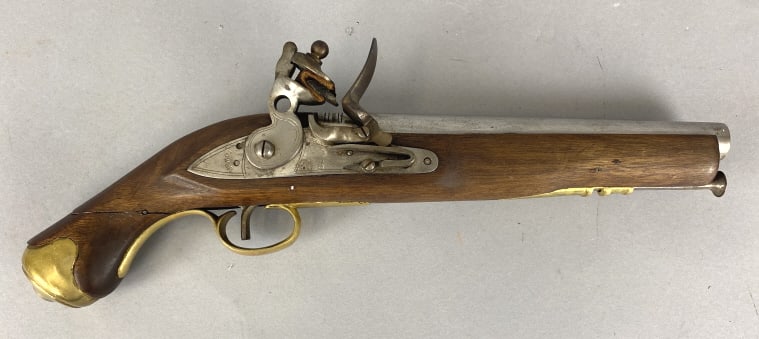 Tower Flint Lock Pistol Marked Japan: Tower Flint Lock Pistol Marked Japan. 16" long Condition: Crack in the stock.