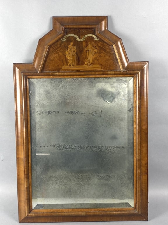 Continental Walnut & Beveled Glass Mirror: Continental Walnut & Beveled Glass Mirror. 32 1/2"h x 21"w Condition: Loss of molding, crazed silvering on mirror.