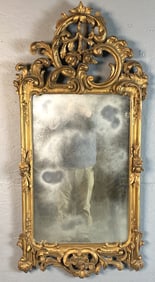 Highly Carved Giltwood Mirror