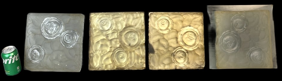 4 Art Deco Glass Wall Tiles: 4 Art Deco Glass Wall Tiles. 2 with mirror silvering on back. 10 1/4"sqr. Condition: Some chips to edges, overall wear.