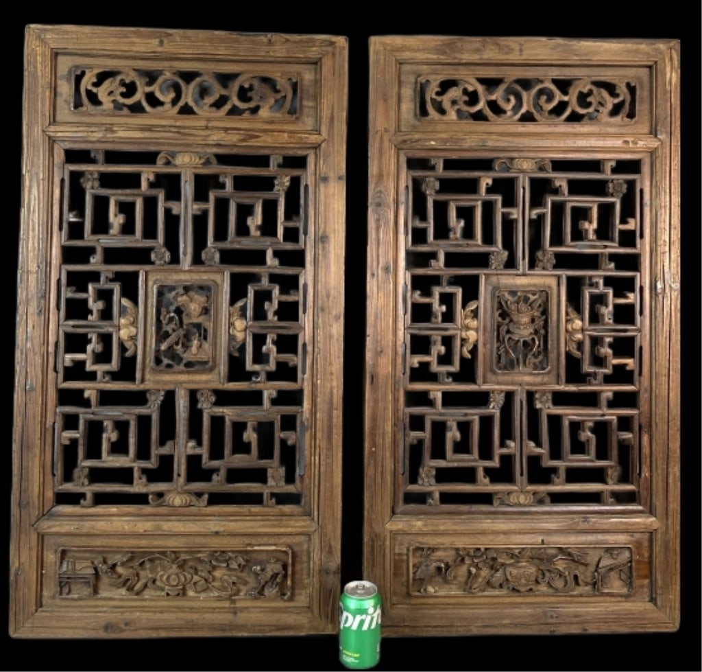 Pair of Chinese Carved Wood Panels: Pair of Chinese Carved Wood Panels. 40"h x 21 1/2"w Condition: Overall wear, some cracks.