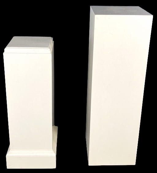 2 White Painted Wood Pedestals: 2 White Painted Wood Pedestals. Taller: 25 1/2"h x 14"sqr. Condition: Scratches, scuffs, chipped paint.