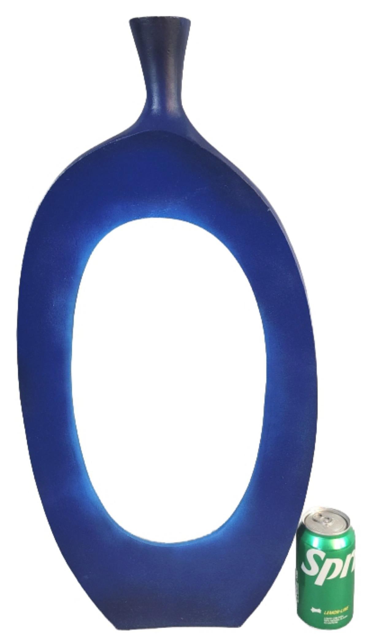 Azul Blu Metal Sculpture: Azul Blu Metal Sculpture. Signed on bottom. Purchased from Anthony Liggins Gallery 88. 24 3/4"h x 12"w x 2"d Condition: Small scuffs.