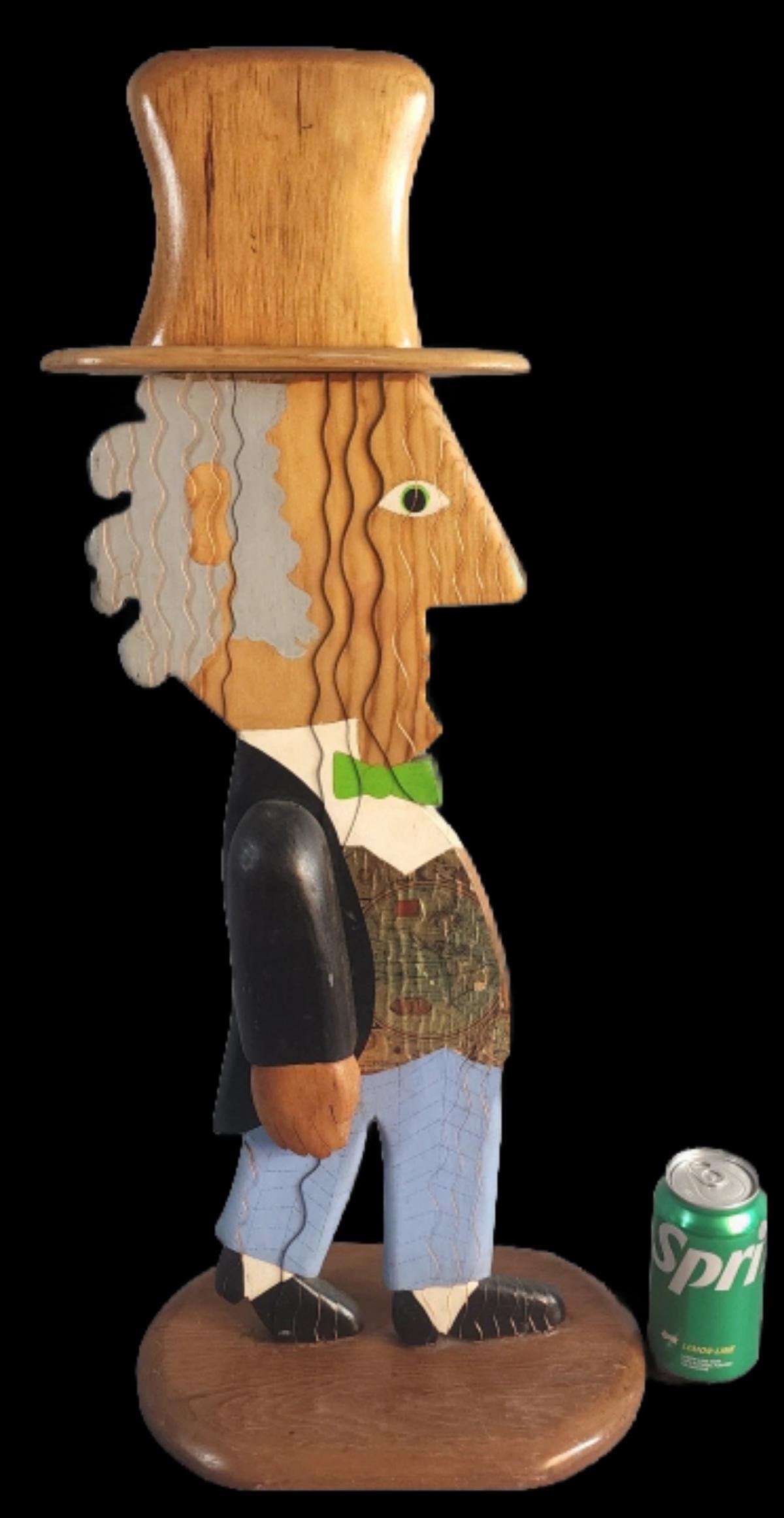 William Accorsi Wood Puzzle Sculpture: William Accorsi Wood Puzzle Sculpture Accorsi sticker on bottom. 28"h x 11 1/2"w x 7 1/4"d Condition: Man is leaning sideways