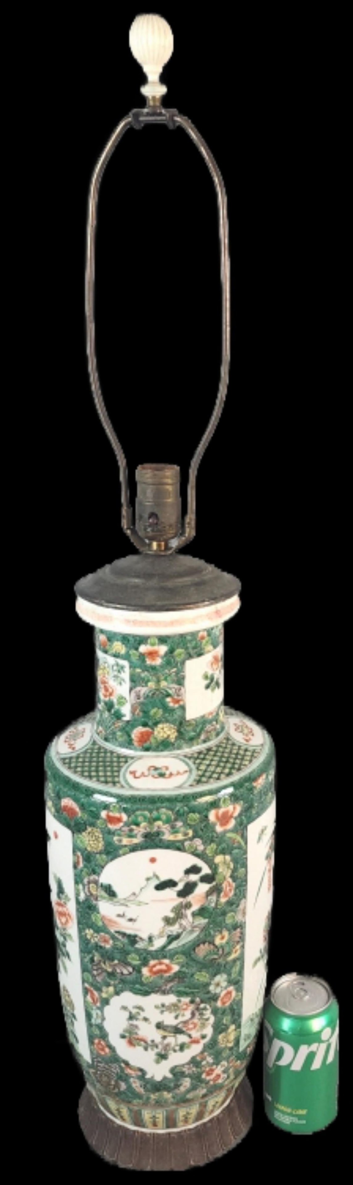 Famille Verte Chinese Porcelain Lamp: Famille Verte Chinese Porcelain Lamp. To top of finial: 34 1/2"h x 7 1/2"diam. Condition: Untested, old repair to neck of lamp.