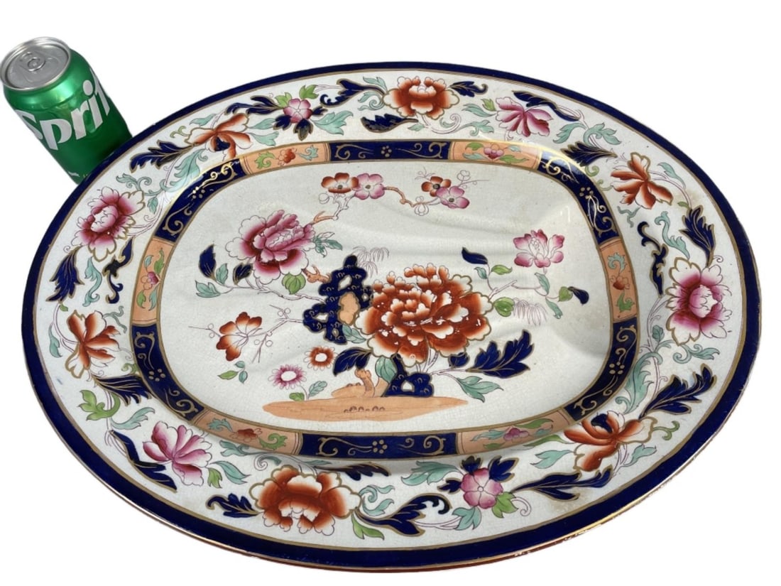 Brownfield Peony Pattern Ironstone Meat Platter: Brownfield Peony Pattern Ironstone Meat Platter. 2"h x 20"w x 16"d Condition: Rubbed paint, crazing, minor staining.
