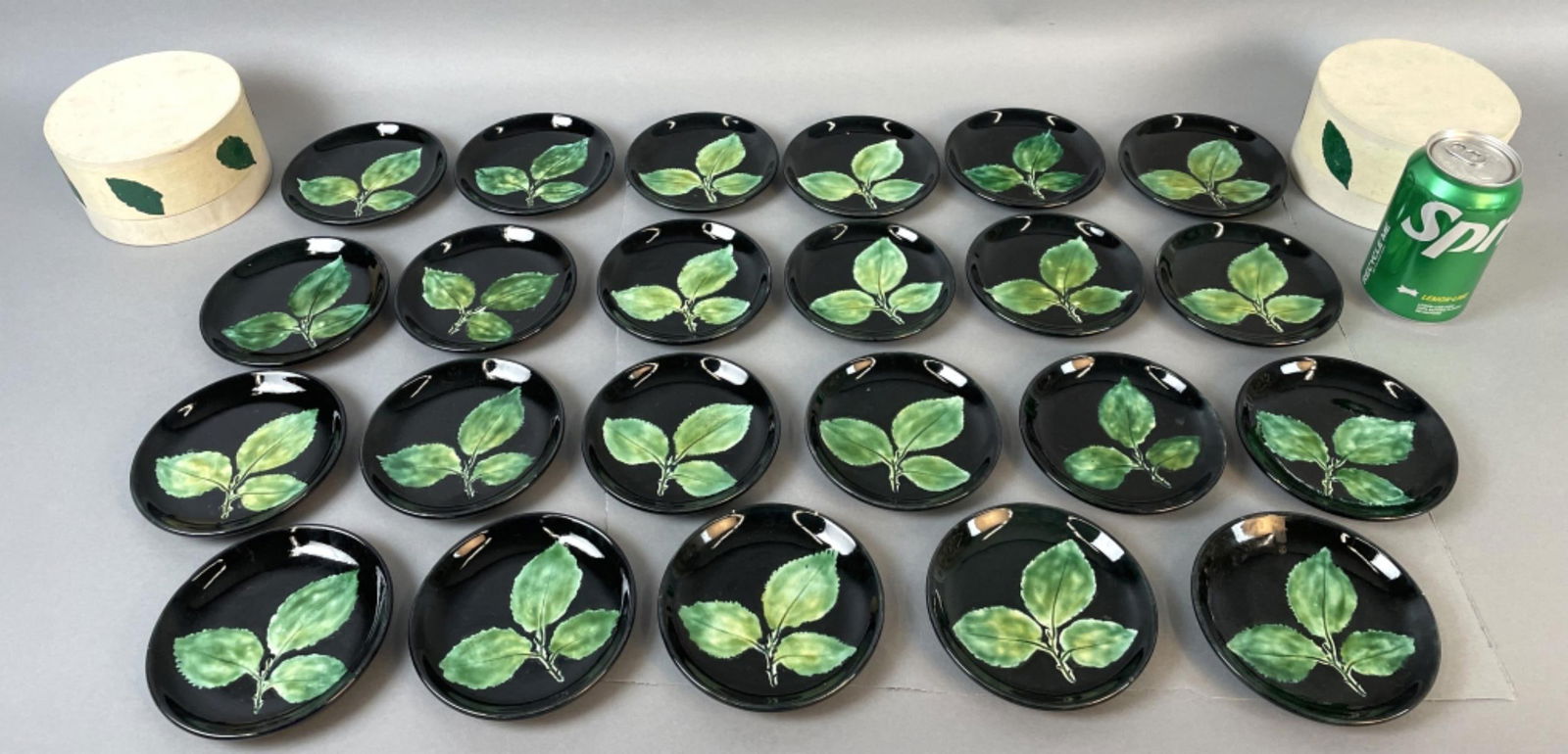 23 Saks Fifth Avenue Portuguese Leaf Plates: 23 Saks Fifth Avenue Portuguese Leaf Plates. 4 3/4"diam. Condition: Small chips on 3.