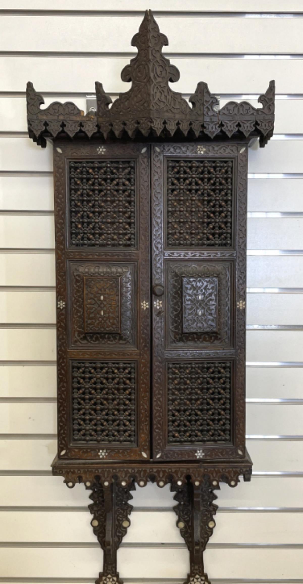 Moroccan Stick & Ball Hanging Photo Album: Moroccan Stick & Ball Hanging Photo Album. 45"h x 17 1/2"w x 9 1/2"d Condition: Some loss of wood, old repairs.