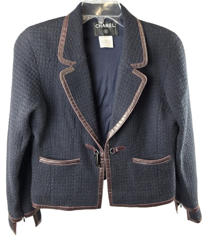 Chanel Size 44 Wool Jacket: Chanel Size 44 Wool Jacket. 22 3/4"length x 16"shoulders 15 1/2"wide Condition: Good.