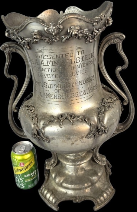Art Nouveau Style Silverplate Trophy: Art Nouveau Style Silverplate Trophy. Presented in NY, 1913. 18"h x 12 1/2"w x 9"d Condition: Needs cleaning, break in handle, worn finish, not straight, holes from pitting.