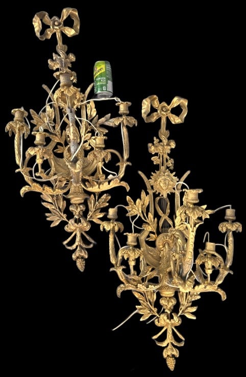 Pair of Louis XVI Style Gilt Bronze Wall Sconces: Pair of Louis XVI Style Gilt Bronze Wall Sconces. 37"h x 17 1/4"w x 14"d Condition: Missing 3 bobeche, tarnish, needs fixtures.