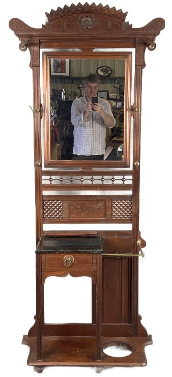Victorian Walnut Hall Stand: Victorian Walnut Hall Stand. 82"h x 34 1/2"w x 13"d Condition: Loss of molding, missing umbrella drip tray, scratches, scuffs.