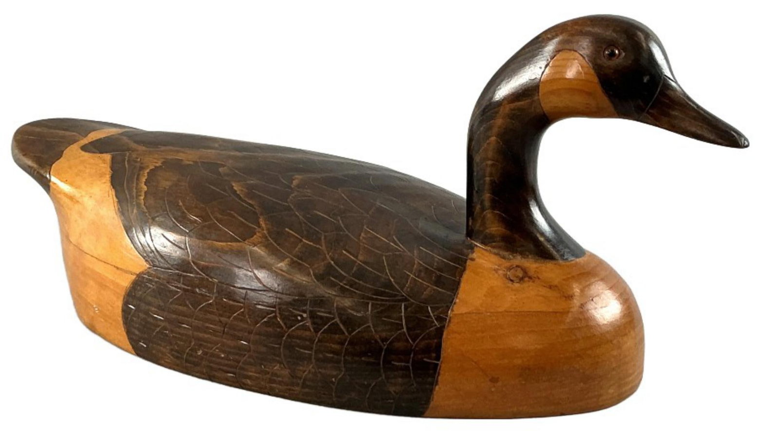 J Buck (American, 20th C) Canada Goose Decoy: J Buck (American, 20th century) Canada goose hand carved wooden decoy. Signed on underside. Measures 22"l x 9?w x 9.5?h. Condition: Good, some scratches.