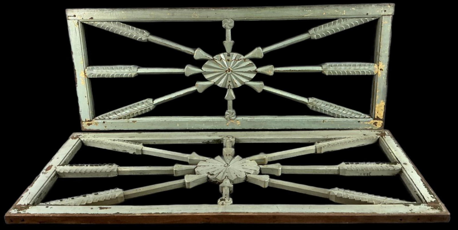 Pair of Paint Decorated Wood Transom Panels: Pair of Asian style paint decorated carved wood transoms or architecture panels with oval and arrow motifs. Measure 50.75"h x 20.5"w. Condition: Wear to surface, loss to paint, scratches and nicks.