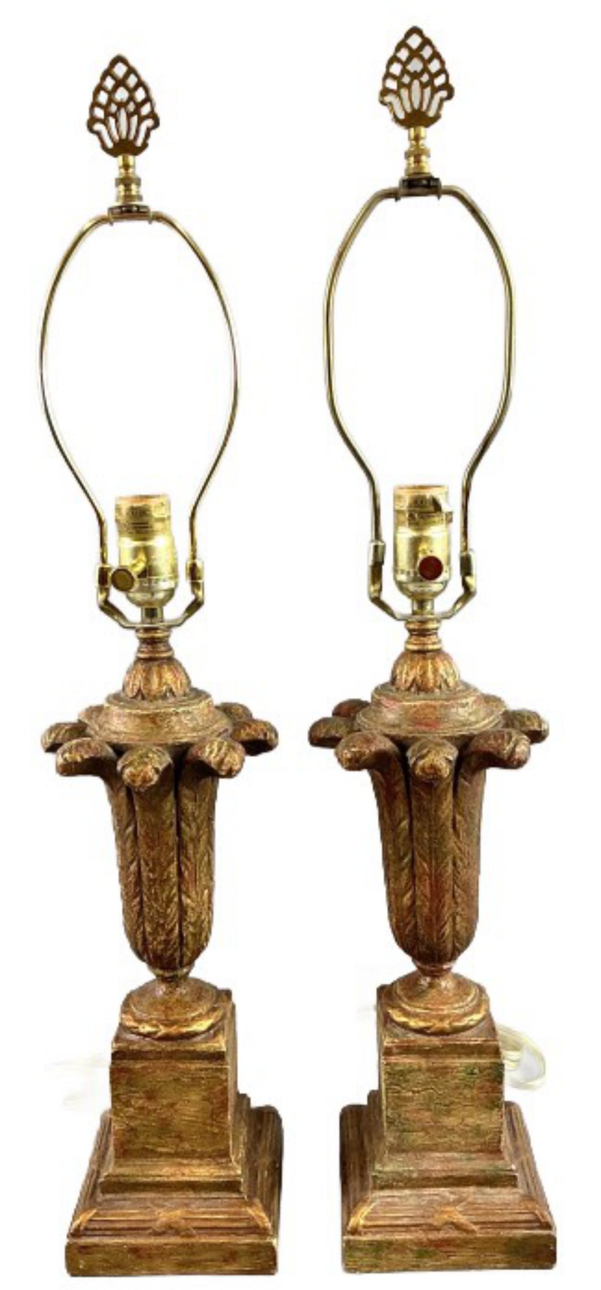 Pair of Gilt Neoclassical Style Pedestal Lamps: Pair of gilt Neoclassical style pedestal table lamps. Composite and wood. Measure 5.5"dia x 28"h. Condition: Untested. Some scratches and loss to gilt.