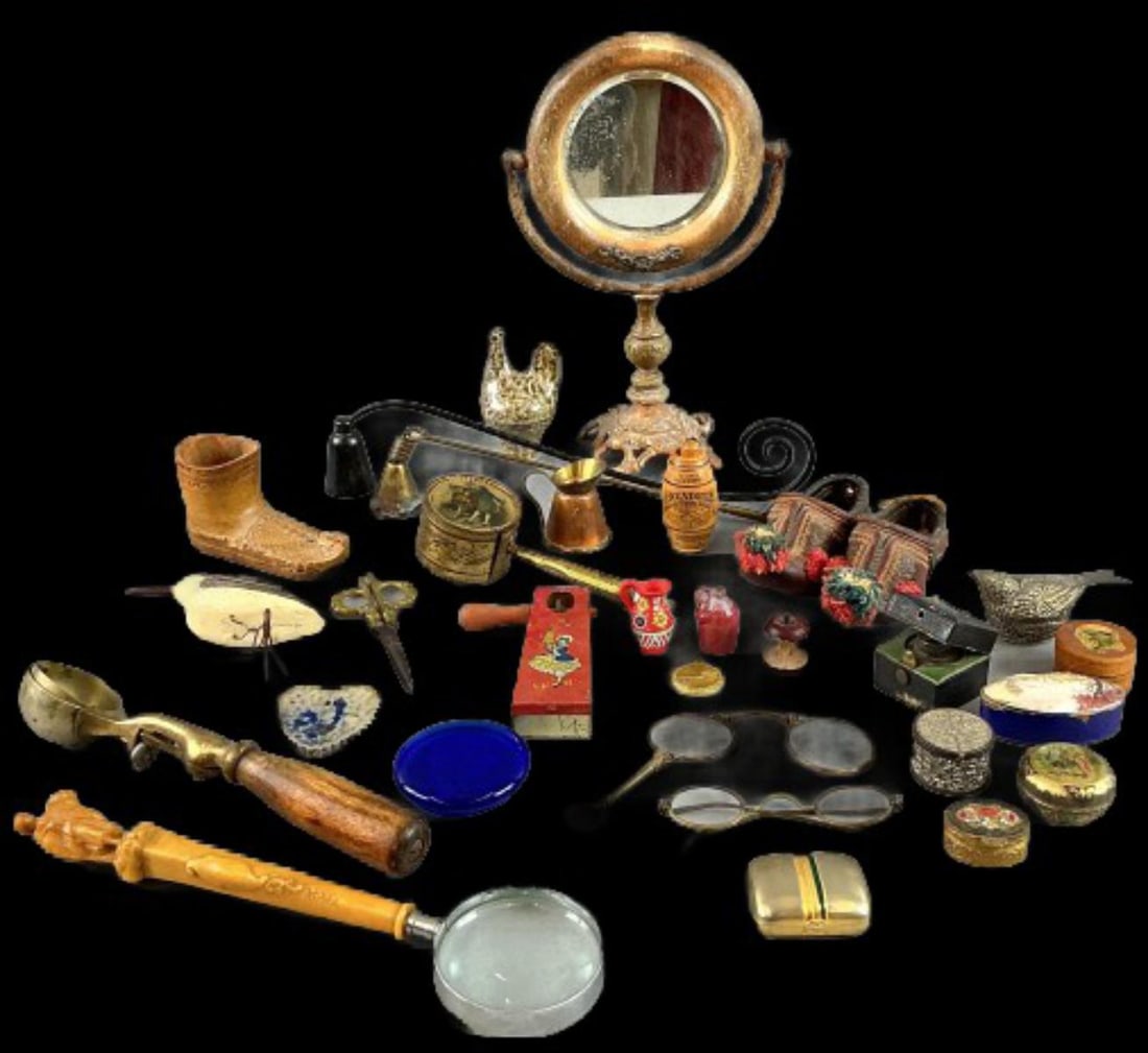 Group of Trinket Boxes, Figurines & Other Articles: Grouping of trinket boxes, figurines, and other articles. Comprised of: Gucci gold plated trinket box A standing vanity mirror Carved wood shoe and handmade leather shoe figurines Miniature copper pit