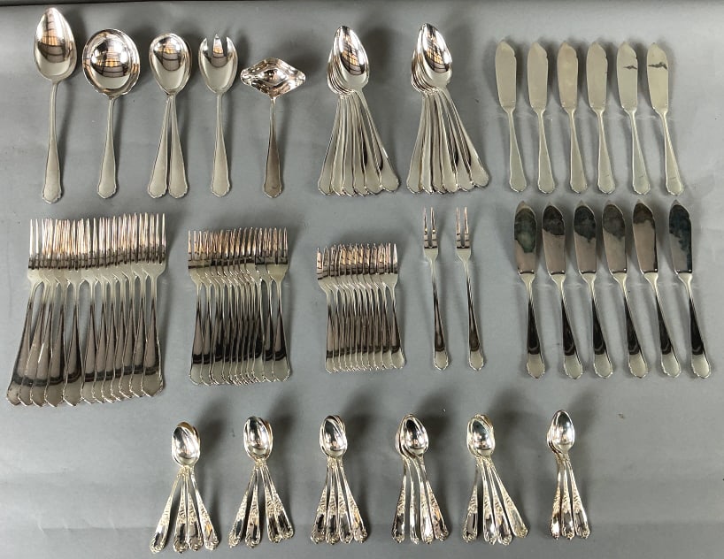 Grouping of French Silver Plate Cutlery: Grouping of silver plate cutlery. Set of 23 French teaspoons, marked Metal Blanc and hallmarked illegibly. Set of 67 pieces service for 12 silverware, marked 90 and hallmarked illegibly. Largest piece