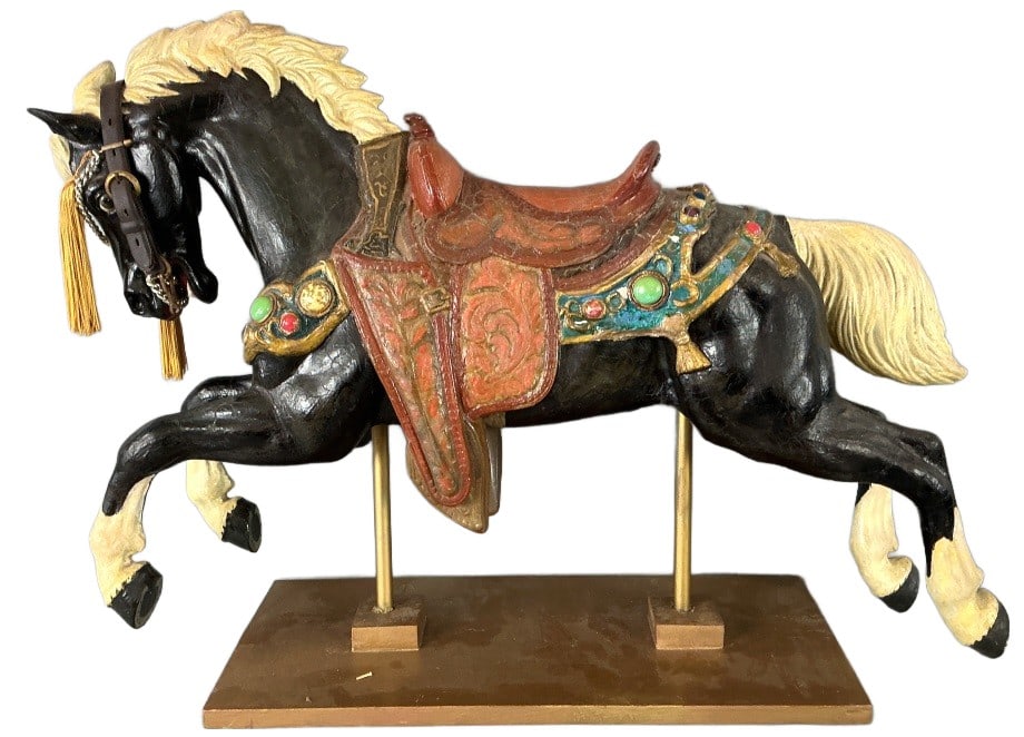 Ornate Paper Mache Carousel Horse: Coronate paper mache carousel horse. Paint decorated with tassels and lucite cabochons. Measures 22.5"h x 31"l x 6.5"w. Condition: Loose on base. Some scratches and loss to paint. Back legs have repai