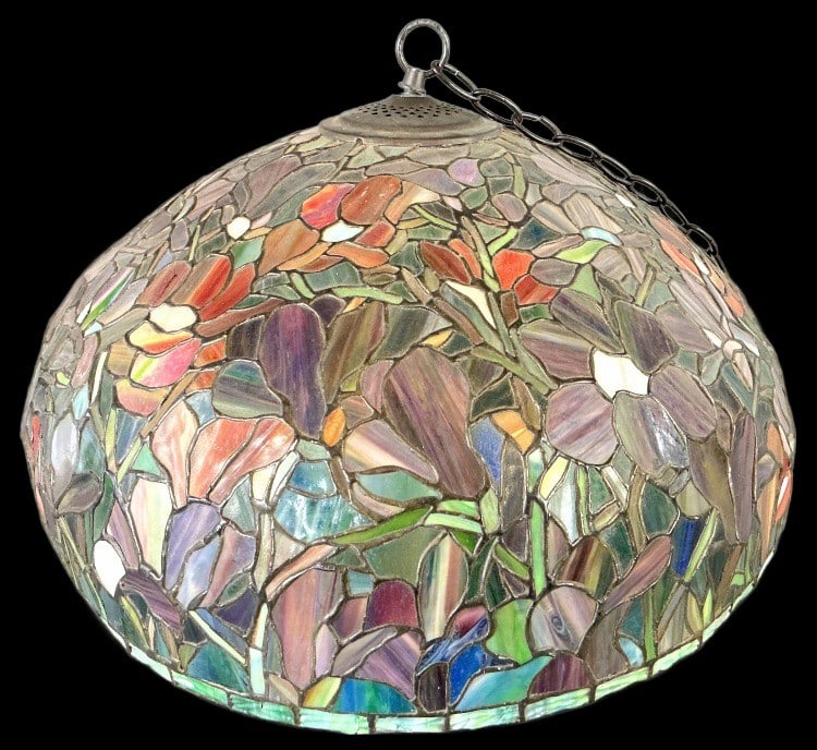 Art Nouveau Style Stained Glass Pendant Lampshade: Art nouveau style stained glass pendant lampshade. Floral design. Measures 12"h x 22"dia. Condition: Bent, cracked and chipped pieces, see photos.