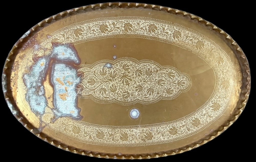 Large Moroccan Style Oval Brass Tray: Large Moroccan style oval brass tray with etched design. Measures 45.75"l x 28.75?w. Condition: Needs polishing and cleaning.