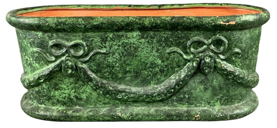 French Country Style Green Ceramic Planter: French country style ceramic planter. Paint decorated in green with swag pattern. Measures 8.25"h x 21"w x 8?d. Condition: some chipped paint and crazing.