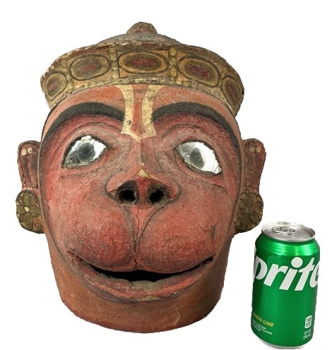 Indian Folk Paint Decorated Hanuman Mask: Indian folk Hanuman Ramlila mask. Paint decorated with glass eyes. Measures 14"h x 10.5"w x 11.5"d. Condition: Some cracks, loss to paint.