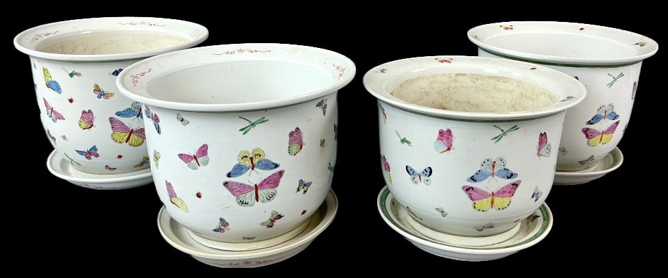 Grouping of 4 Asian Porcelain Butterfly Planters: Grouping of 4 Asian hand painted butterfly planters with under plates. Largest planter measures 9.25"h x 12.5"dia. Condition: All pieces have surface wear, scratches.