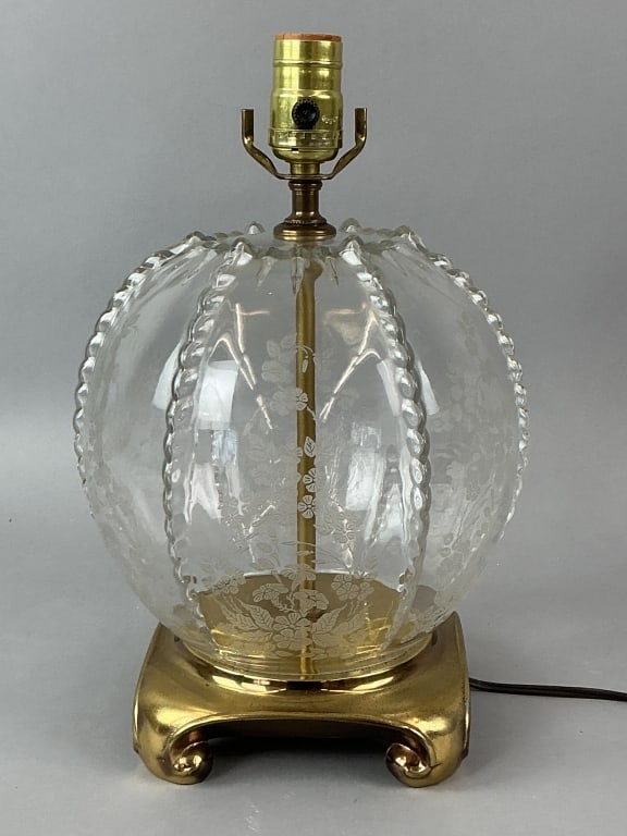 Hollywood Regency Style Etched Glass Lamp: Hollywood Regency style spherical etched glass lamp with floral motifs. Measures 13.5"h x 8"dia. Condition: Untested. Some scratches.
