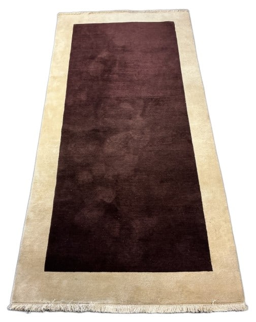 Tan & Brown Wool Area Rug: Wool area rug with geometric pattern in brown with tan border and fringe. Measures 8?l x 3?9"w. Condition: Good.