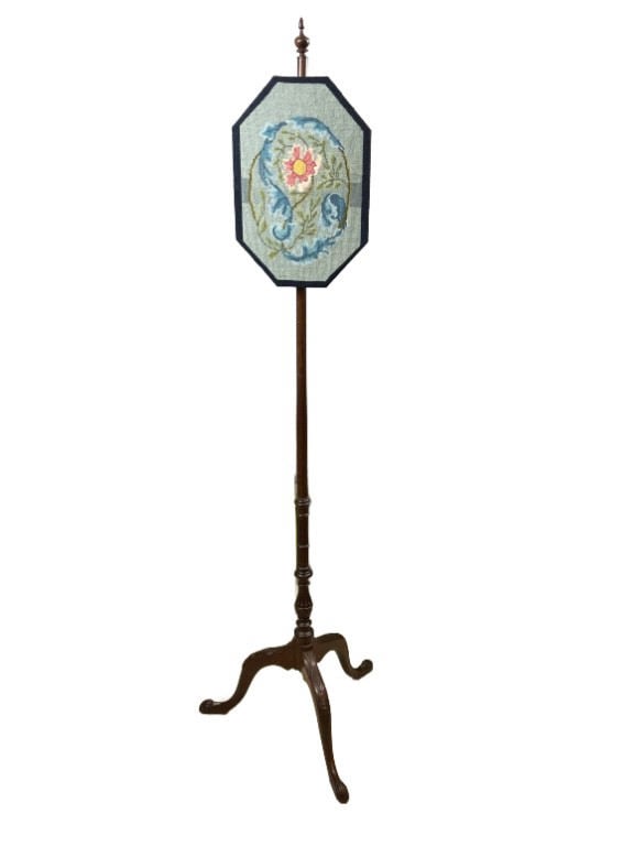 Victorian Style Pole Screen with Needlepoint Panel: Victorian style pole screen with octagonal needlepoint panel. Measures 58.75"h x 18?w x 17?d. Condition: Some scratches. Small chip to finial.