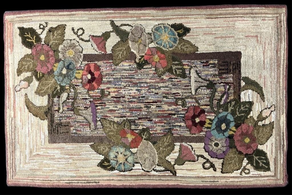 American Folk Art Hand Hooked Rug: American folk art hand hooked rug mounted on fabric and board. Floral design. Measures 30.5"h x 47.5"w (mounted). Condition: Wear around edges, some losses and discoloration.