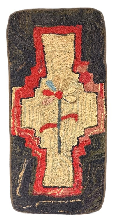 Antique American Folk Art Hand Hooked Rug: Antique American folk art hand hooked rug mounted on fabric. Multicolor floral medallion design. Measures 48"h x 23.5"w (mounted). Condition: Discoloration, pulling, pilling, and losses.