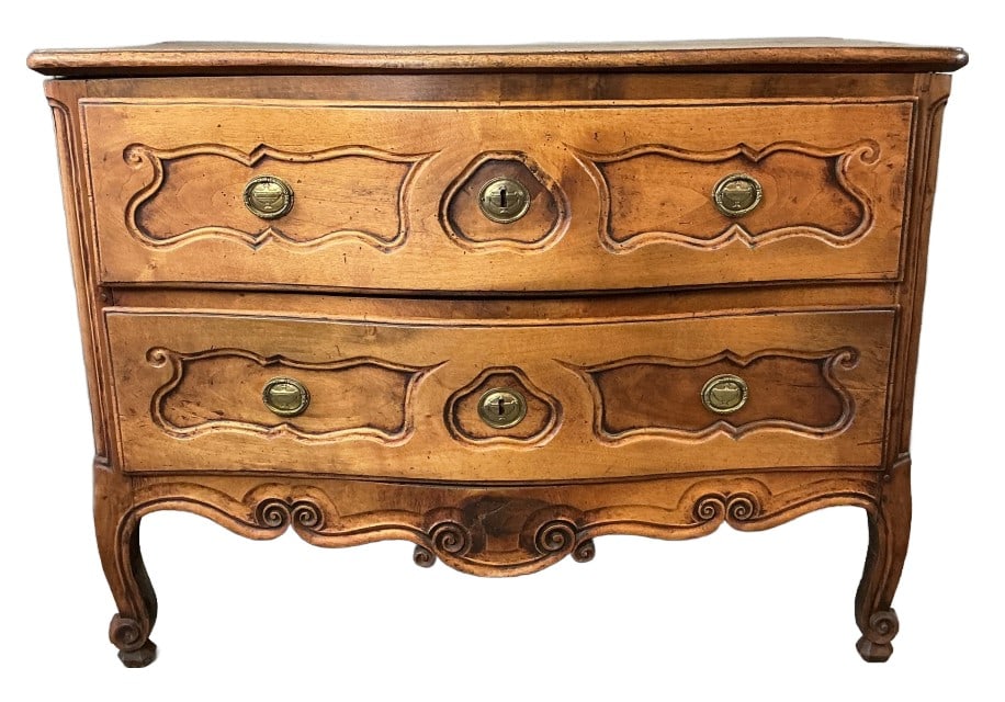 18th C French Provincial Walnut Two Drawer Commode: 18th Century French provincial walnut two drawer commode. Measures 35"h x 46.5"w x 28"d. Condition: Old repairs, overall wear. Some stains and loss to finish. Some cracks.