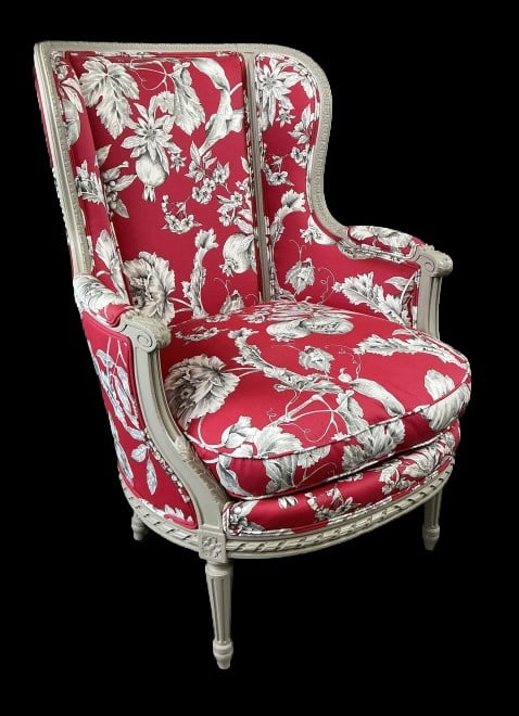 Louis XVI Style Upholstered Bergere Chair: Louis XVI style upholstered and paint decorated chair. Measures 40.25"h x 29"w x 31"d. Condition: Some old repairs.