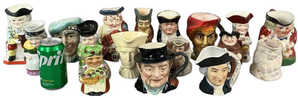 Large Grouping of Toby & Character Jugs: Large groups of Toby and character jugs. Comprised of 17 total pieces. Tallest measures 6.5"h. Condition: Some wear to all pieces, scratches, crazing, and chips.