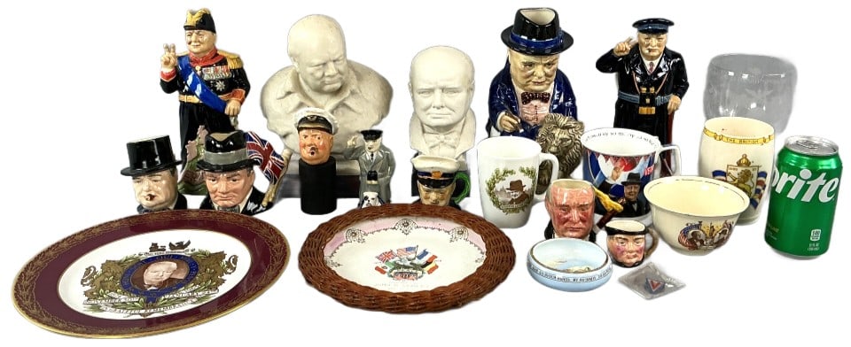 Grouping of Winston Churchill & Other Articles: Grouping of Winston Churchill and other articles. Comprised of: 2 Churchill busts, 9 jugs, 1 bottle stopper/pourer, 2 cups, 1 etched glass goblet, and 6 other articles. Tallest piece measures 9"h. Con