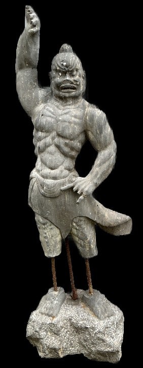 Asian Carved Stone Figure: Asian carved stone figure. Measure 61"h x 21.5”w x 17”d. Condition: Some loss of stone.