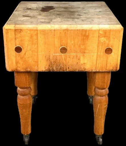 Wooden Butcher Block Table: Wooden butcher block table. Measures 30.5"h x 24? square. Condition: Some wear to top, scratches and scuffs.