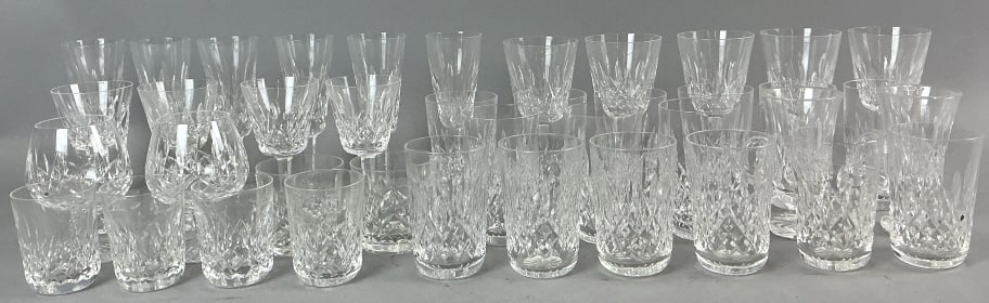 Set of 40 Waterford Lismore Crystal Glasses: Set of 40 pieces Waterford crystal glasses. Lismore pattern. Assorted styles. Tallest measures 7.25"h. Condition: Some minor scratches.