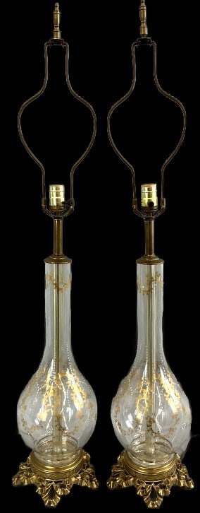 Pair of Victorian Lantern Style Gilt Glass Lamps: Pair of Victorian lantern style table lamps. Hand painted enamel and gilt accents. Measure 26.75"h (base to socket) x 7.5"dia (base). Condition: Untested. Minor loss to gilt and enamel.